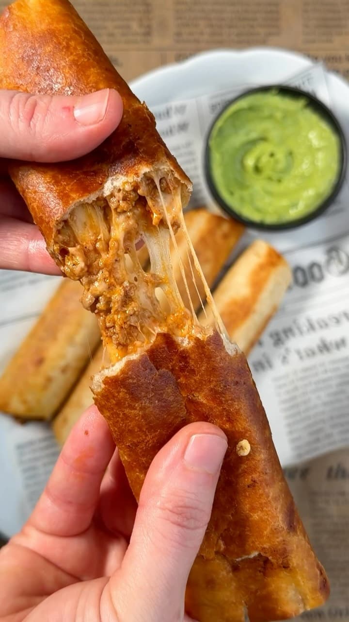 Crispy Cheesy Beef Taquitos with Creamy Avocado Sauce