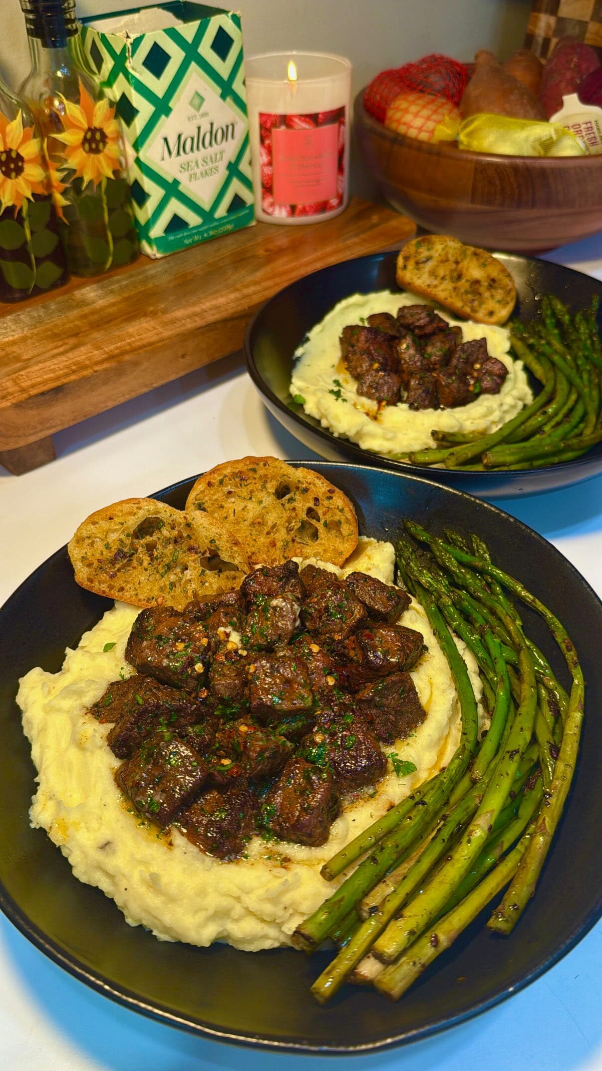 Cajun Butter Steak Bites over Parmesan Mashed Potatoes