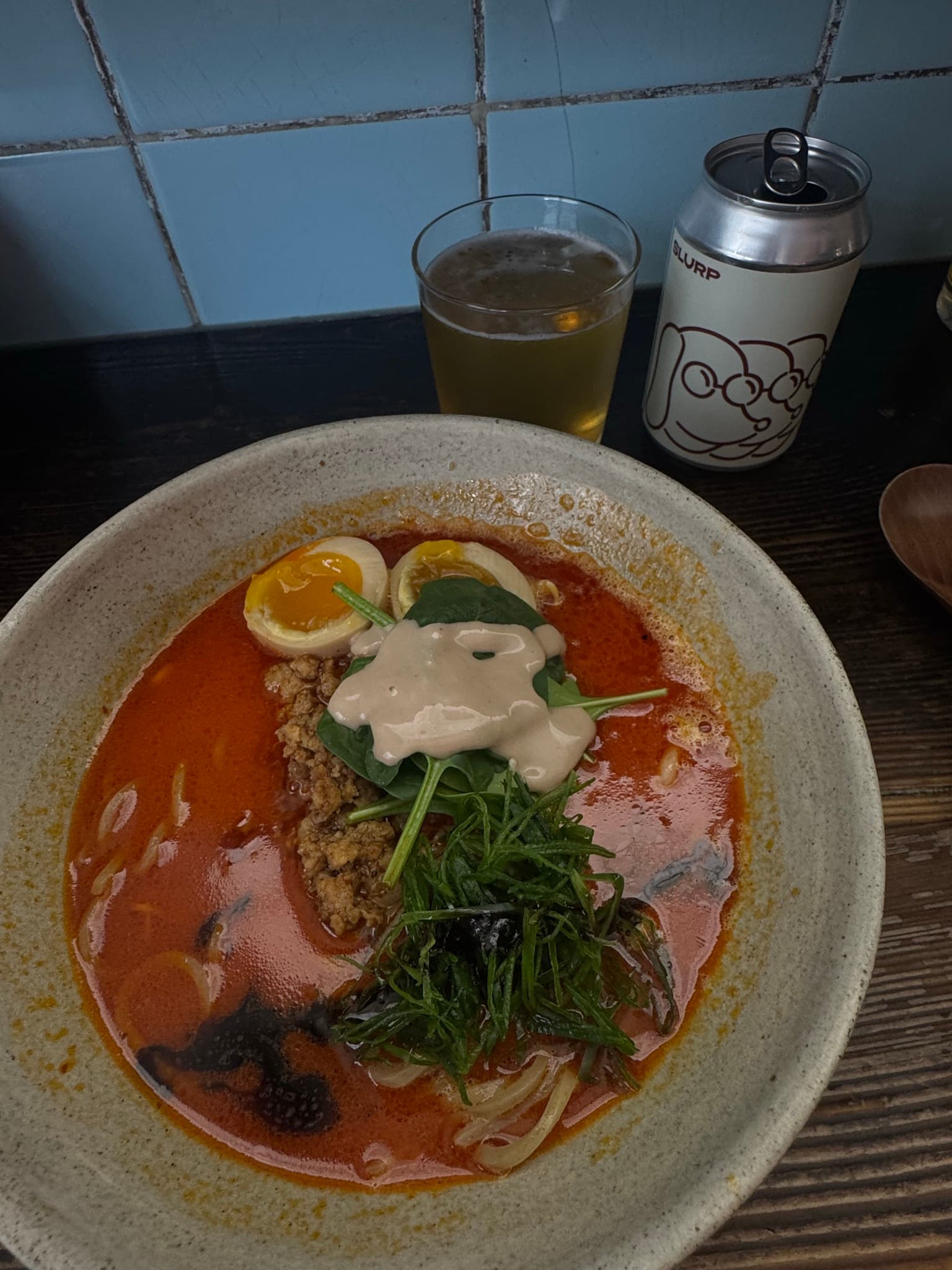 Spicy Red Ramen Bowl with Soft Egg, Spinach, and Minced Meat