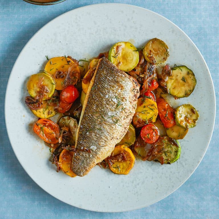 Sea bass with sizzled ginger, chilli & spring onions